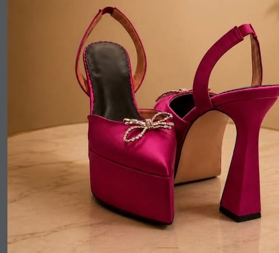 Balanced platform heel in magenta satin with crystal bow detail and 5.5-inch statement heel, handcrafted Marikina atelier